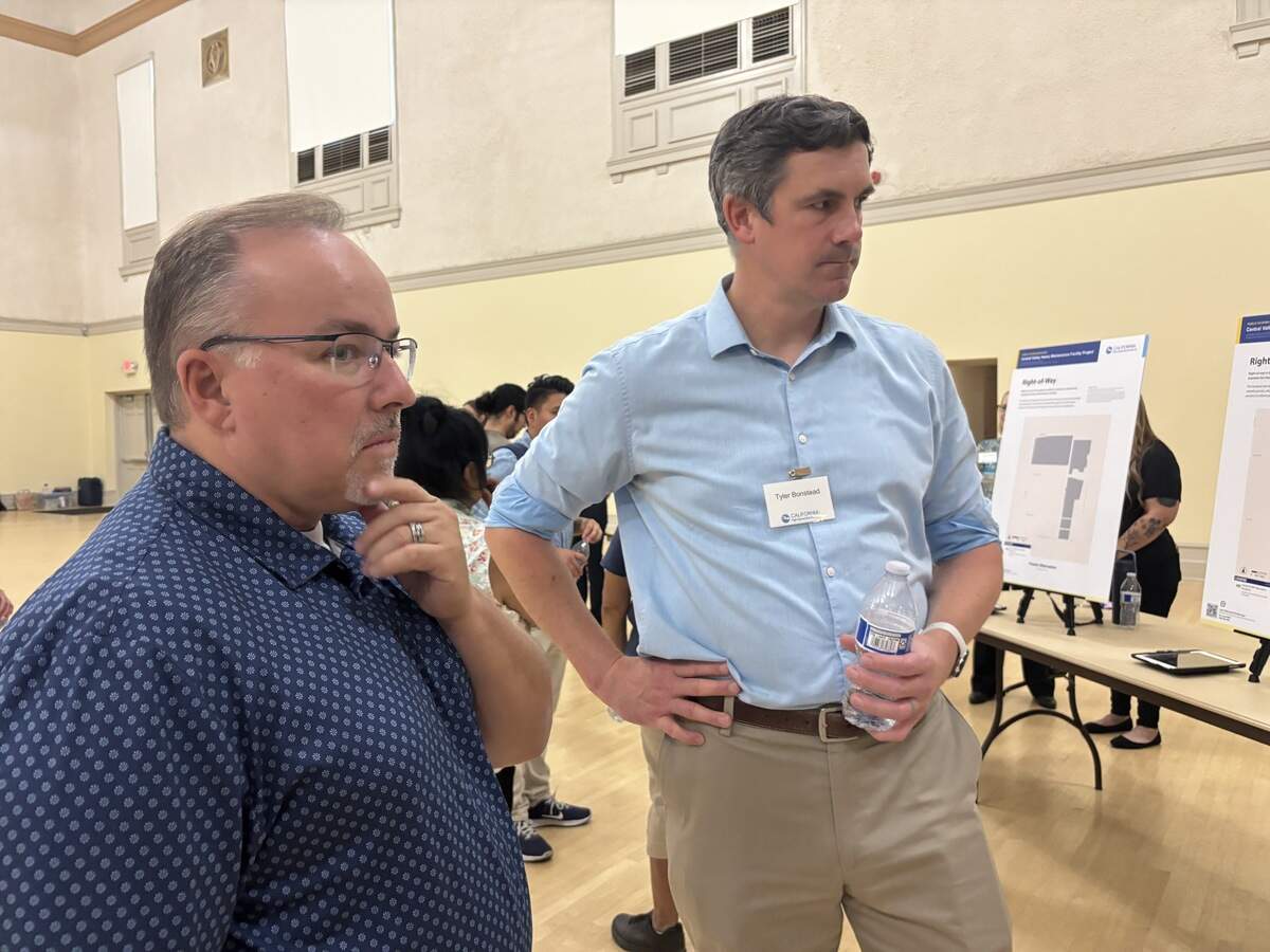 Hanford Councilmember Travis Paden, left, during the in-person “public scoping meeting“ in Hanford.